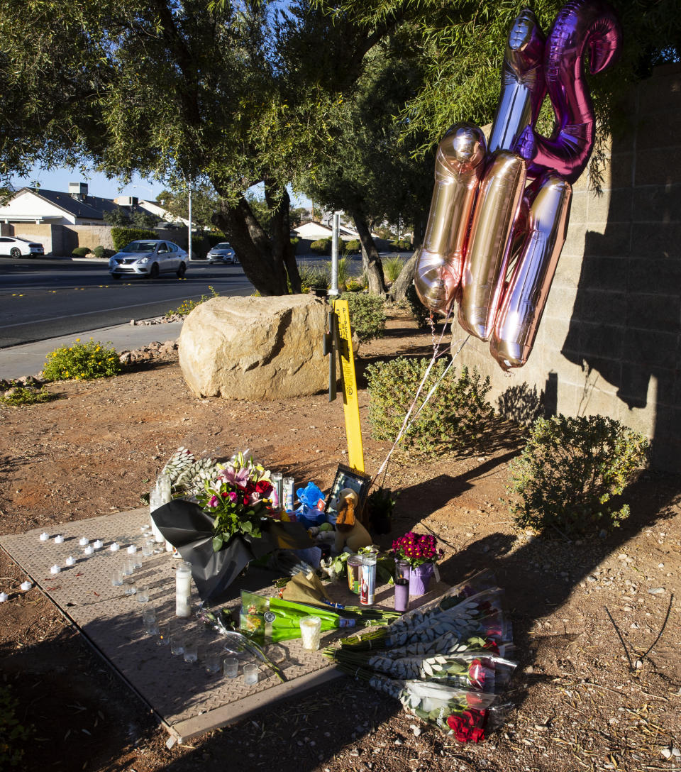 A makeshift memorial to honor Tina Tintor, 23, is seen at South Rainbow Boulevard and Spring Valley Parkway, on Thursday, Nov. 4, 2021, in Las Vegas. Tintor and her dog were killed when former Raiders wide receiver Henry Ruggs, accused of DUI, slammed into the rear of Tintor's vehicle. (Bizuayehu Tesfaye/Las Vegas Review-Journal)