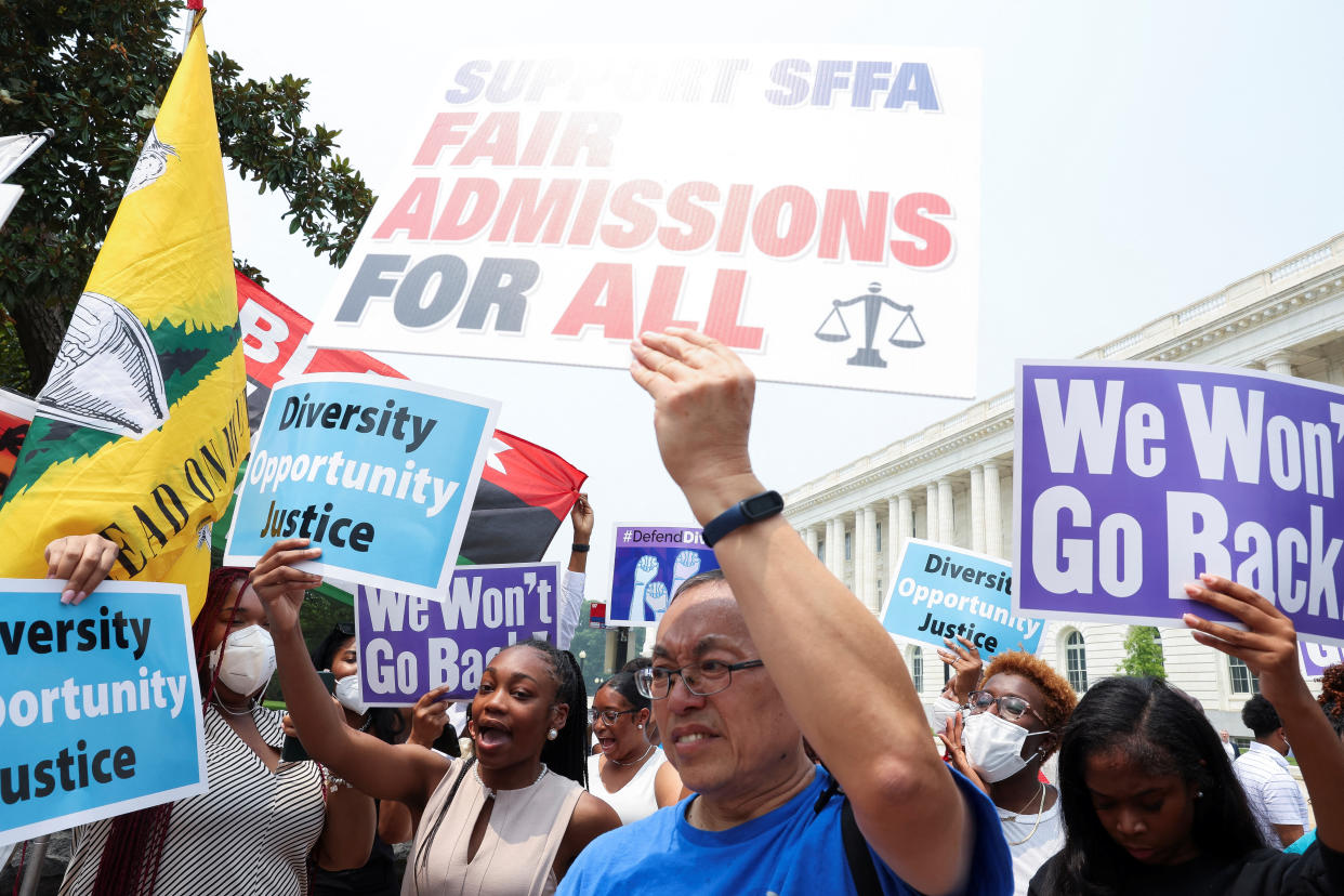 Demonstrators for and against the U.S. Supreme Court decision to strike down race-conscious student admissions programs at Harvard University and the University of North Carolina confront each other, in Washington,  on June 29, 2023. (Evelyn Hockstein/Reuters)