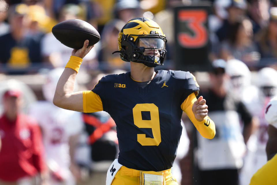 Michigan quarterback J.J. McCarthy (9) throws against Rutgers in the first half of an NCAA college football game in Ann Arbor, Mich., Saturday, Sept. 23, 2023. (AP Photo/Paul Sancya)