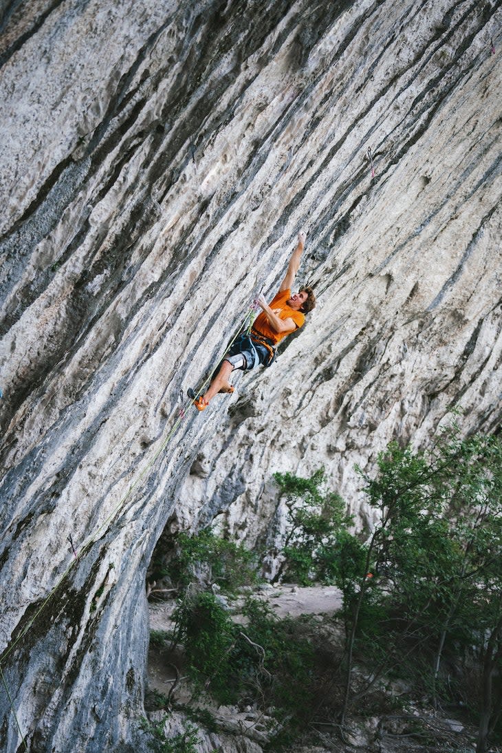 <span class="article__caption">Bouin low on the route. It’s 5.14b to get to the first of the two boulder problem cruxes. </span> (Photo: Lena Drapella)