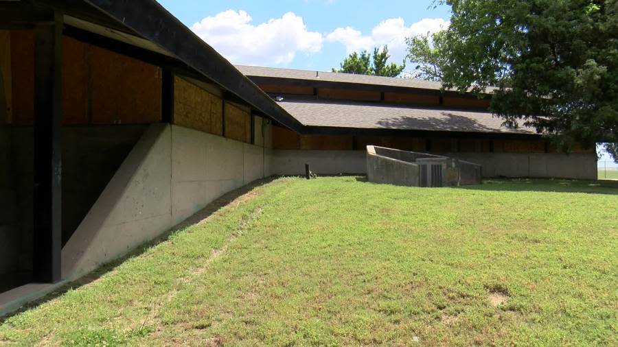 A building at Pawnee Prairie Park in Wichita is boarded up after damage from thieves and vandals. (KSN News Photo)