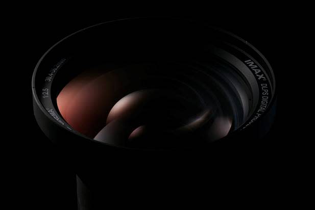 A camera lens with the IMAX logo on the edge.