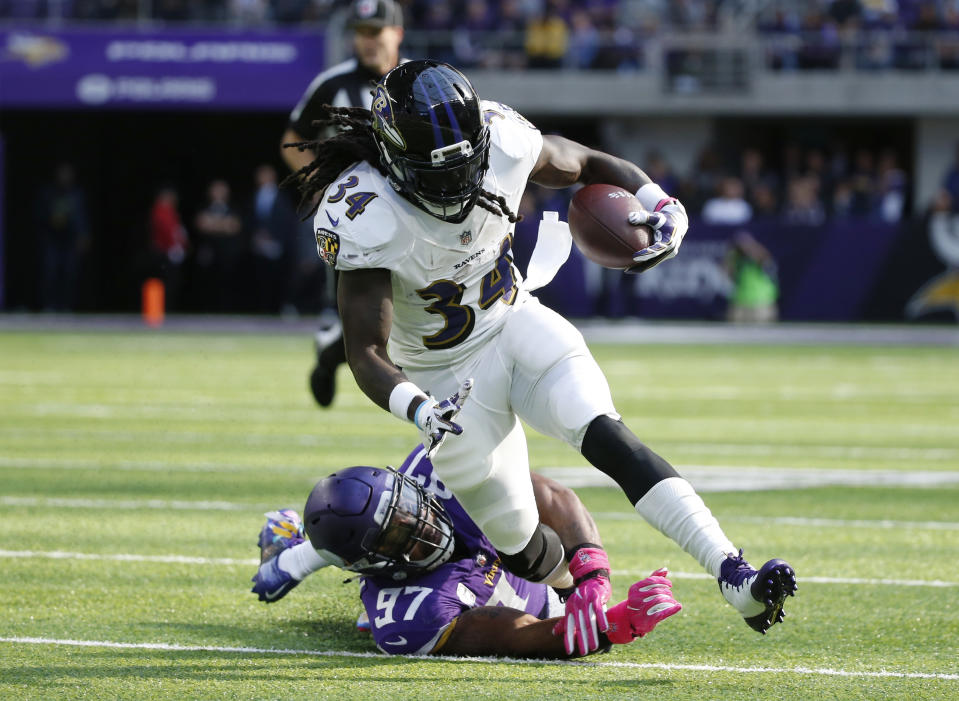 Alex Collins has handled double-digit carries in four straight games, and he’s coming off a 100-plus yard performance against Miami. (AP Photo/Bruce Kluckhohn)