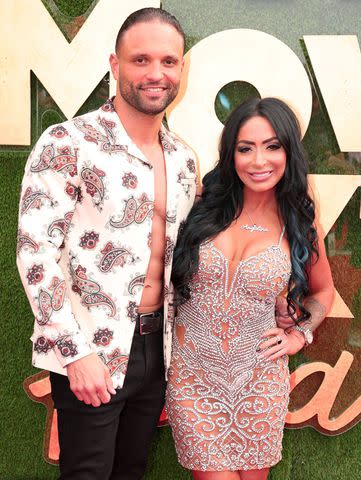 <p>Christopher Polk/Shutterstock </p> Vinny Tortorella and Angelina Pivarnick got engaged during an April episode of their reality series.