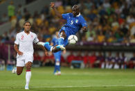 KIEV, UKRAINE - JUNE 24: Mario Balotelli of Italy strikes the ball as Glen Johnson of England looks on during the UEFA EURO 2012 quarter final match between England and Italy at The Olympic Stadium on June 24, 2012 in Kiev, Ukraine. (Photo by Scott Heavey/Getty Images)