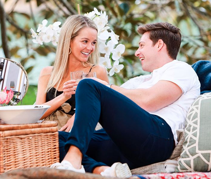 Helena Sauzier and Matt Agnew recline on the set of The Bachelor Australia 2019