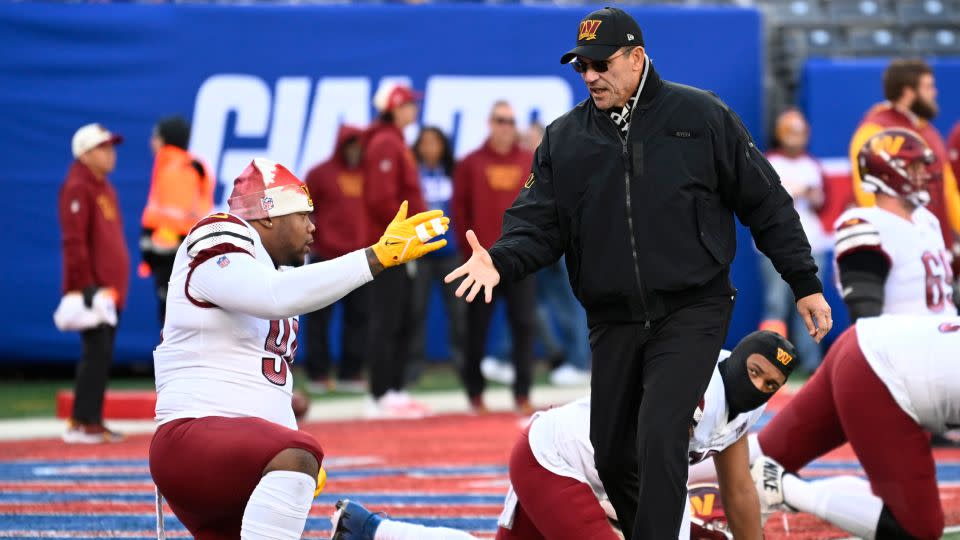 Commanders defensive tackle Daron Payne (94) shakes hands with Washington Commanders head coach Ron Rivera. - John McDonnell//The Washington Post/Getty Images