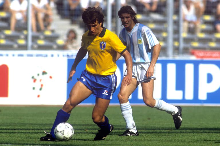 Dunga in action for Brazil, watched by Argentina's Claudio Caniggia.   (Photo by Peter Robinson - PA Images via Getty Images)