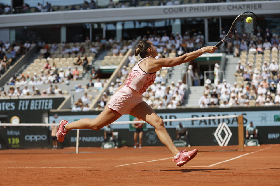 Aryna Sabalenka of Belarus plays a shot against Karolina Muchova of the Czech Republic during their semifinal match of the French Open tennis tournament at the Roland Garros stadium in Paris, Thursday, June 8, 2023. (AP Photo/Jean-Francois Badias)