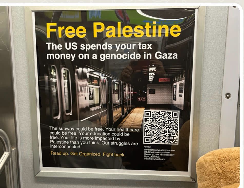 This anti-Israel ad was spotted on an F train this week, one of several “vandalized” MTA ads in the city transit system. Matthew Feinberg/X