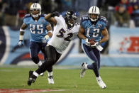 NASHVILLE, TN - JANUARY 10: Wide receiver Justin Gage #12 of the Tennessee Titans looks to avoid a tackle by Ray Lewis #52 of the Baltimore Ravens in the second quarter during the AFC Divisional Playoff Game on January 10, 2009 at LP Field in Nashville, Tennessee. (Photo by Andy Lyons/Getty Images)