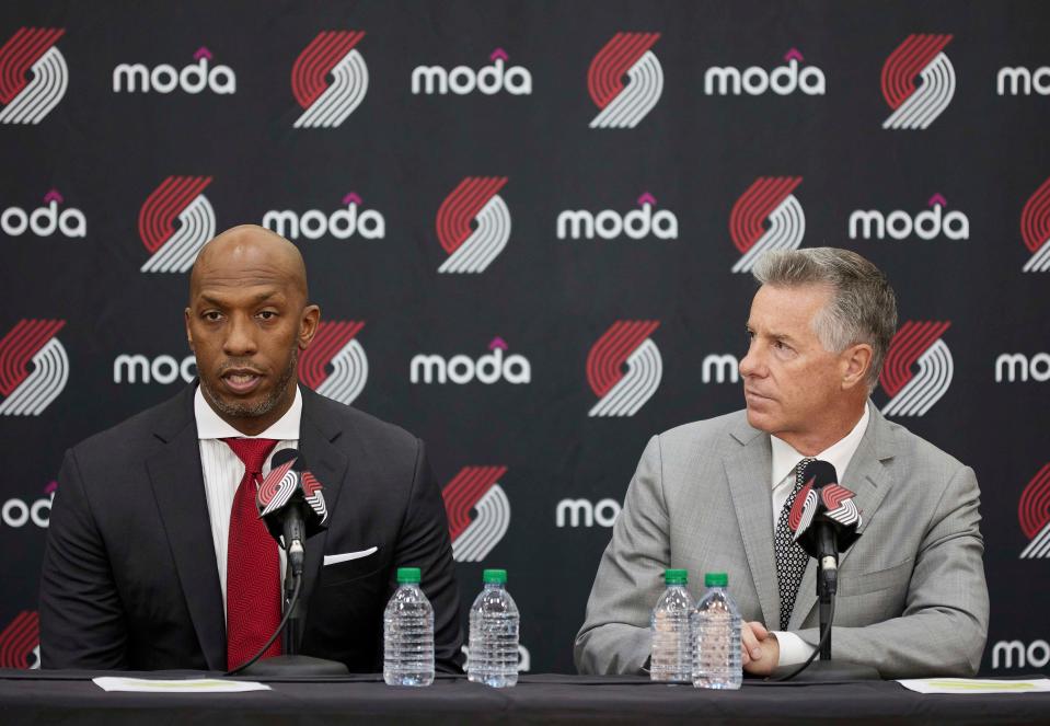 When the Blazers introduced Chauncey Billups as their new head coach on June 29, Neil Olshey (right) said that the franchise conducted a thorough investigation into the rape allegations against Billups.