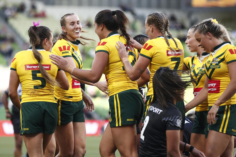 MELBOURNE, AUSTRALIA - OCTOBER 28: Tamika Upton of Australia (2L) celebrates a try that was later disallowed during the women's Pacific Championship match between Australia Jillaroos and New Zealand Kiwi Ferns at AAMI Park on October 28, 2023 in Melbourne, Australia. (Photo by Daniel Pockett/Getty Images)