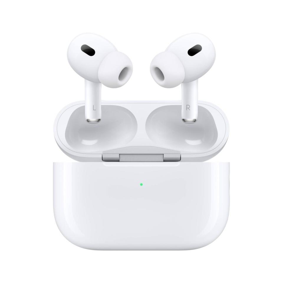 Wireless earbuds in open charging case, showing in-ear design