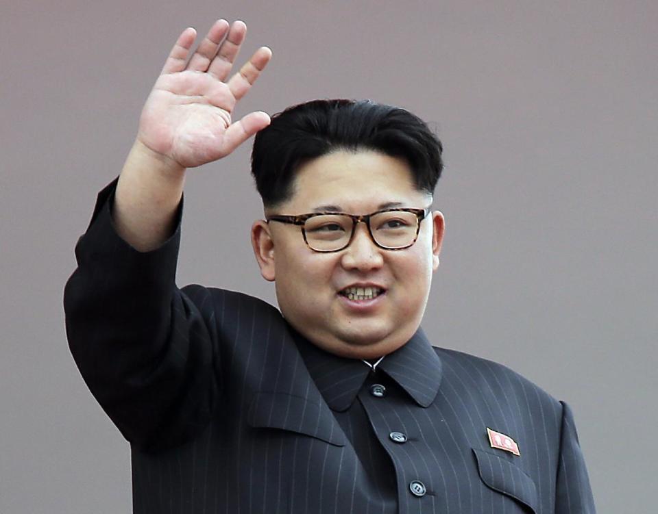 FILE - In this May 10, 2016, file photo, North Korean leader Kim Jong Un waves at parade participants at the Kim Il Sung Square in Pyongyang, North Korea. North Korea is marking Kim Jong Un's birthday Sunday, Jan. 8, 2017 in a decidedly low-key manner. Though the young leader's birthday is well-known throughout the country, it has yet to be celebrated with the kind of adulatory festivities that accompany the birthdays of his late grandfather and father. (AP Photo/Wong Maye-E, File)