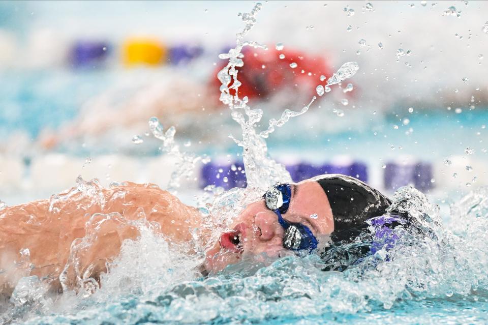 Bloomington South’s Anna Asplund swims the 100 freestyle during a dual meet against Center Grove at South on Wednesday, Jan. 17, 2024.