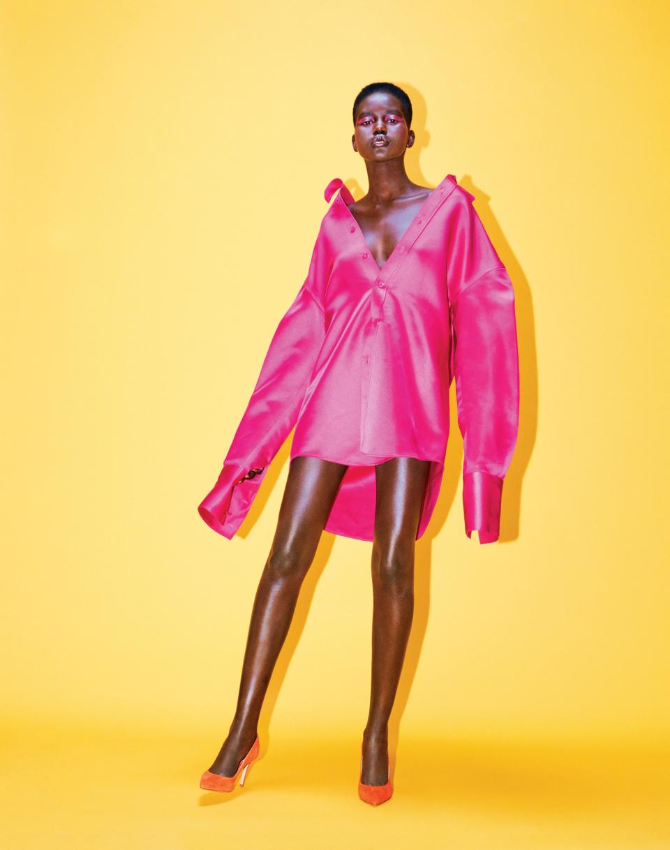 <cite class="credit">Balenciaga shirt. Marion Parke shoes. Makeup colors: Strobe Cream in Goldlite, Chromaline in Process Magenta eye shadow, and Dazzleglass lip gloss in Funtabulous by M.A.C.</cite>