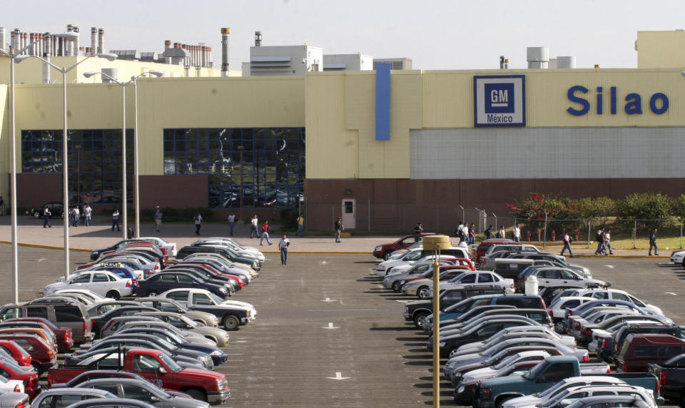 A view of the main entrance to the General Motors assembly plant in the city of Silao, Mexico, Tuesday Feb. 12, 2008. General Motors Corp. reported a $38.7 billion loss for 2007, the largest annual loss ever for an automotive company.  (AP Photo/Mario Armas)