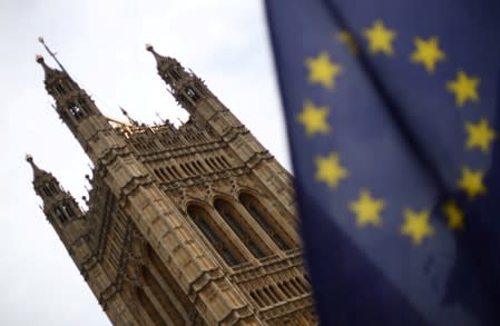 A flag of the European Union is pictured outside the Houses of Parliament in London