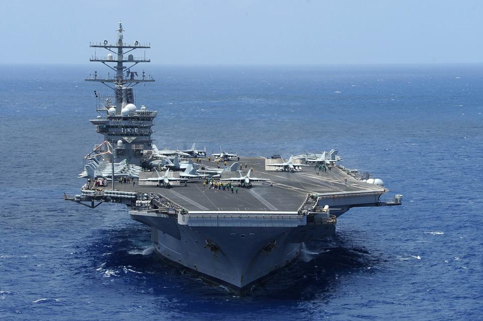 The aircraft carrier USS Dwight D. Eisenhower (CVN 69) transits the Atlantic Ocean during Carrier Air Wing (CVW) 7's fly-off.