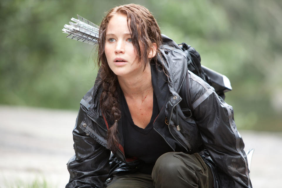 Jennifer Lawrence poses in the wilderness as Katniss in "The Hunger Games"