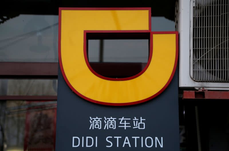 The logo of Didi Chuxing is seen at a Didi station in Beijing