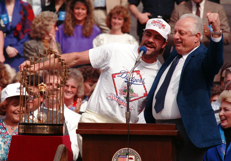 Los Angeles Dodgers outfielder Kirk Gibson, left, hams it up with manager Tommy Lasorda.