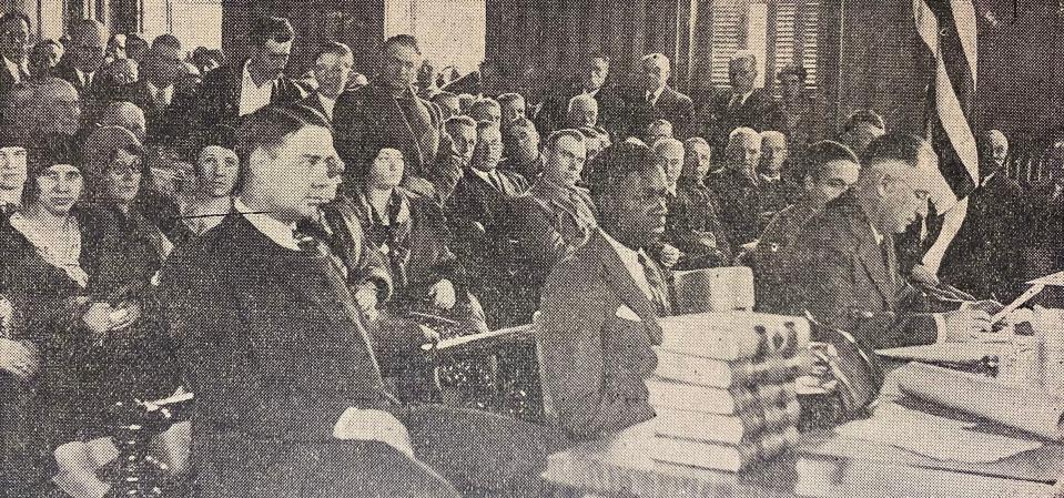A newspaper photo of the courtroom during the 1931 murder trial of Herbert Johnson. Seated, from left, are Deputy Sheriff Jesse Millspaw, defendant Herbert Johnson and Johnson's lawyer, Francis L. Smith.