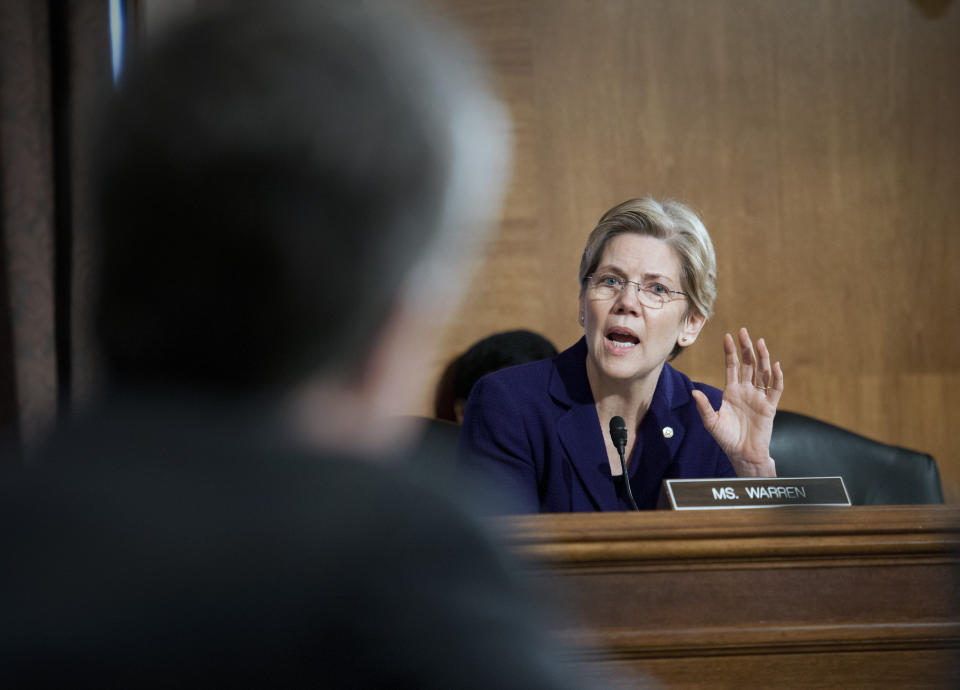 Sen. Elizabeth Warren, D-Mass., questions a witness at Senate Banking Committee hearing on anti-money laundering on Capitol Hill in Washington, Thursday, March 7, 2013.  (AP Photo/Cliff Owen)