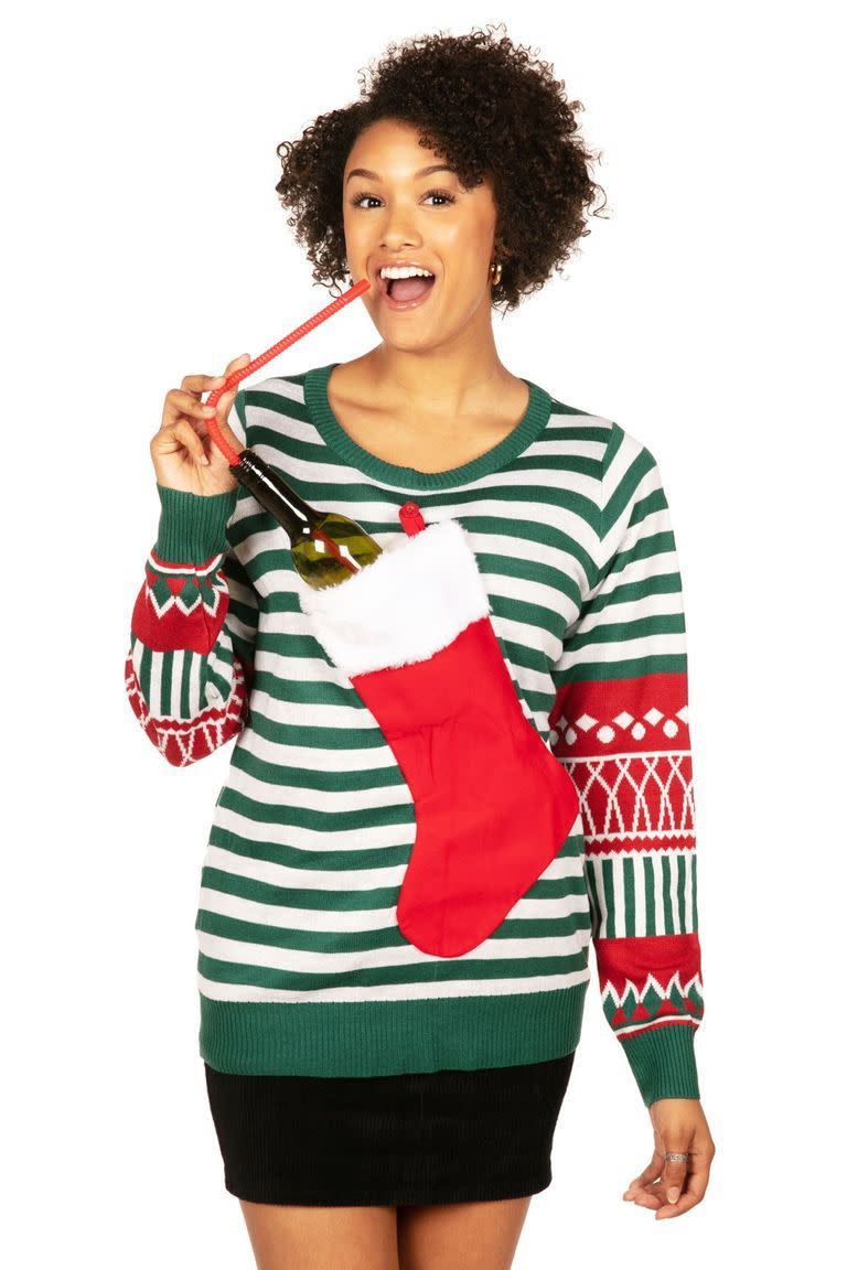 <p><a href="https://go.redirectingat.com?id=74968X1596630&url=https%3A%2F%2Fwww.tipsyelves.com%2Fwomens-stocking-stuffer-ugly-christmas-sweater&sref=https%3A%2F%2Fwww.womansday.com%2Fstyle%2Ffashion%2Fg413%2Fugly-holiday-sweaters%2F" rel="nofollow noopener" target="_blank" data-ylk="slk:Shop Now;elm:context_link;itc:0;sec:content-canvas" class="link ">Shop Now</a></p><p>Stocking Stuffer Ugly Christmas Sweater</p><p>tipsyelves.com</p><p>$64.95</p><span class="copyright">Tipsy Elves</span>