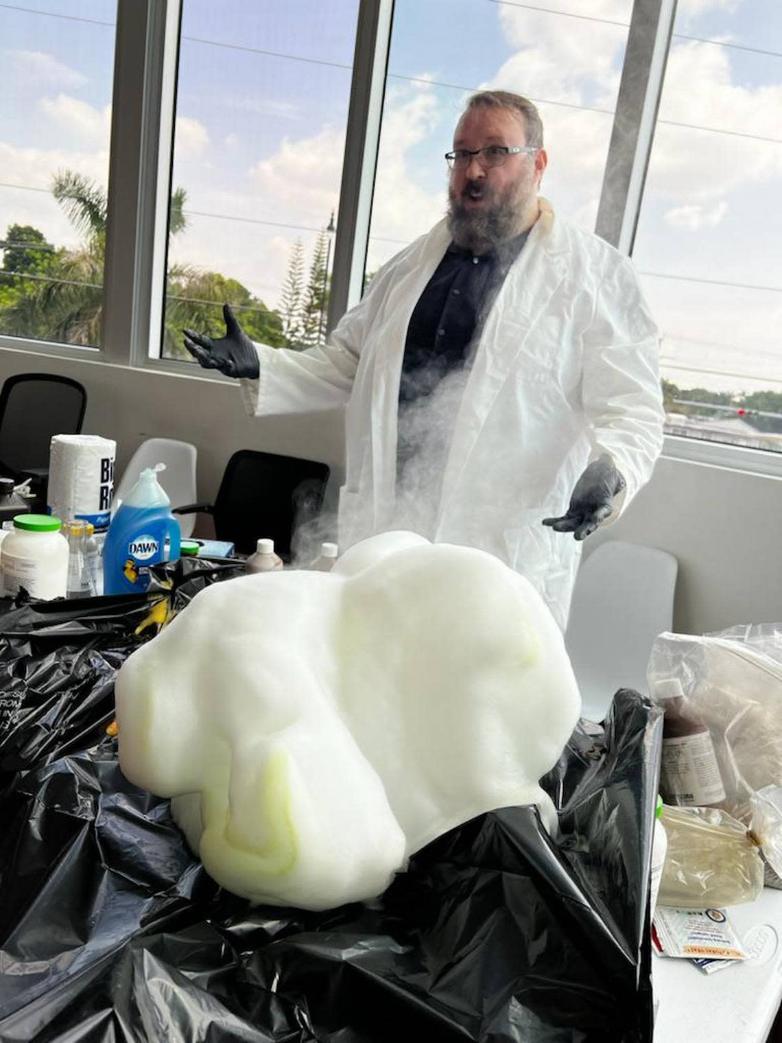 Reggie Rego, Manifezt Foundation director of life sciences, teaches an exothermic chemical reaction that is releasing a lot of oxygen gas at the Larcenia J. Bullard Plaza in Richmond Heights. The STEM event was hosted in September 2022.