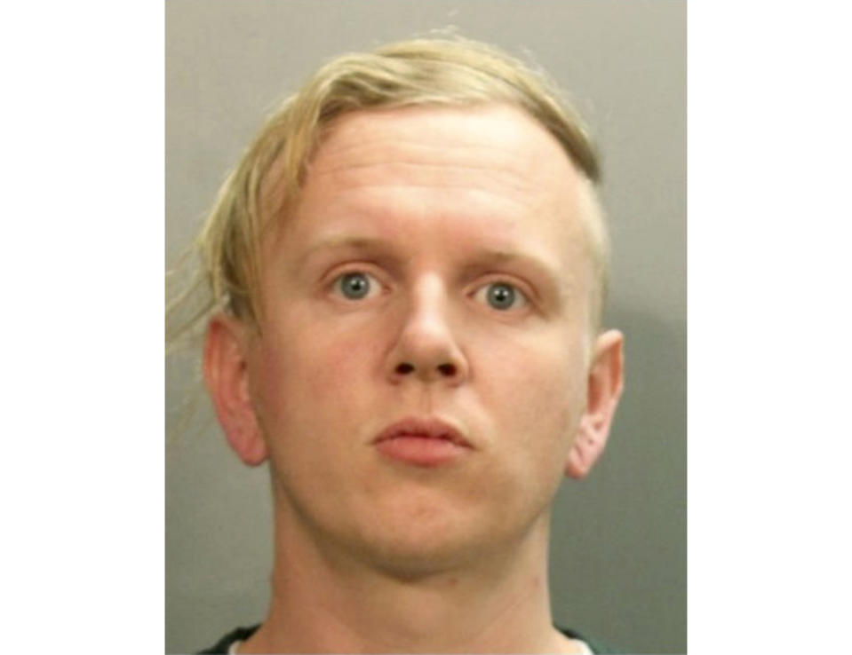This February 2020 booking photo provided by the Jacksonville Sheriff's Office shows Gregory William Loel Timm. The Florida sheriff's office said Sunday, Feb. 9, 2020, that Timm was arrested for driving through a voter registration tent in Jacksonville, Fla. (Jacksonville Sheriff's Office via AP)