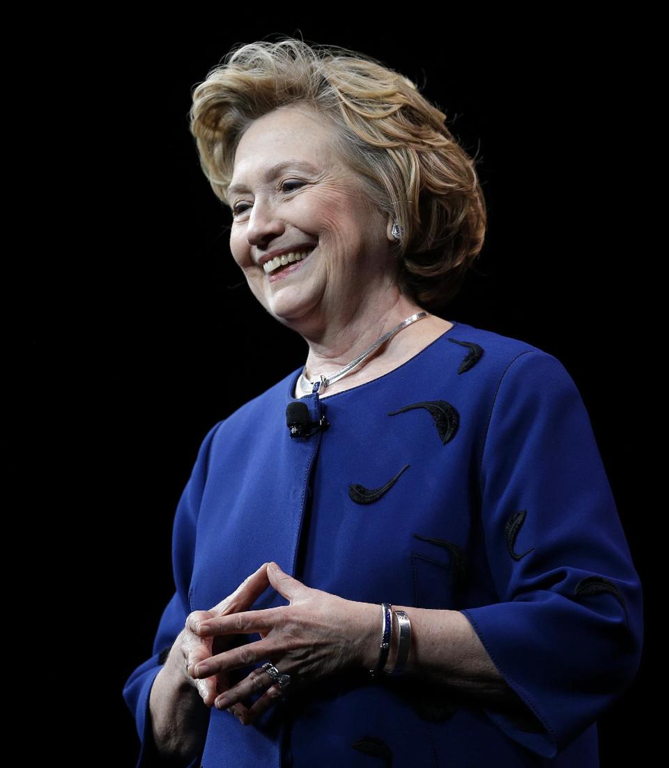 Former Secretary of State Hillary Rodham Clinton smiles while delivering the keynote address at Marketo’s 2014 Marketing Nation Summit Tuesday, April 8, 2014, in San Francisco. (AP Photo/Ben Margot)