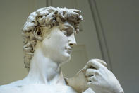 A detail of Michelangelo's 16th century statue of David is seen on display at the Accademia gallery, in Florence, central Italy, Monday, March 18, 2024. Michelangelo’s David has been a towering figure in Italian culture since its completion in 1504. But curators worry the marble statue’s religious and political significance is being diminished by the thousands of refrigerator magnets and other souvenirs focusing on David’s genitalia. The Galleria dell’Accademia’s director has positioned herself as David’s defender and takes swift aim at those profiteering from his image. (AP Photo/Andrew Medichini)