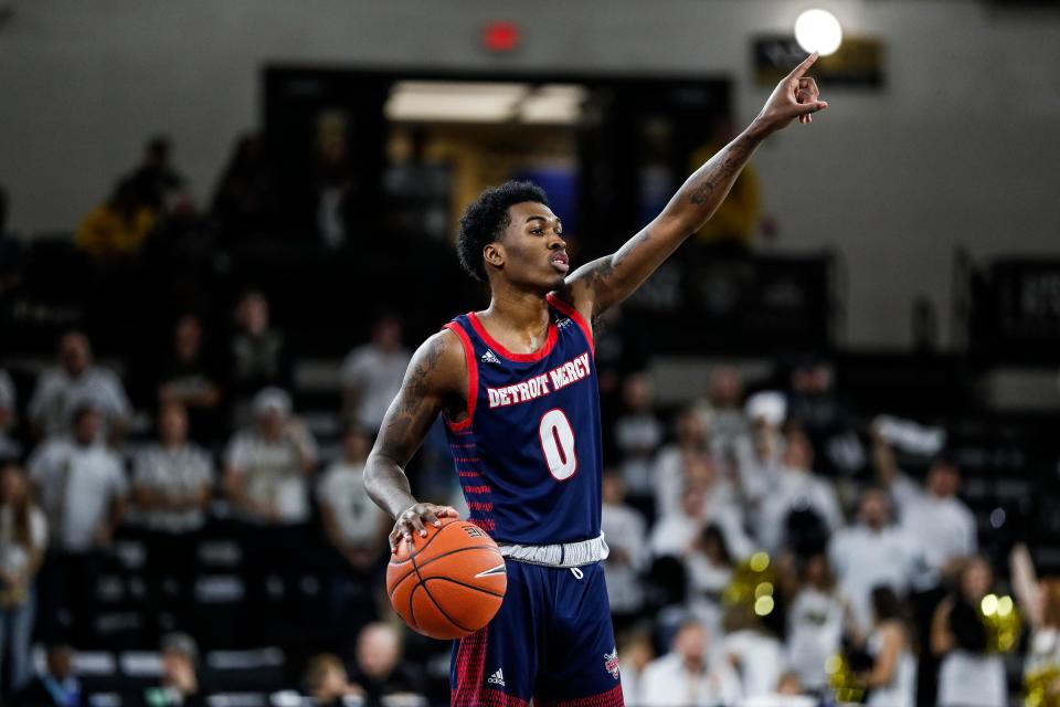 Detroit Mercy Titans guard Antoine Davis (0) dribbles against Oakland Golden Grizzlies during the first half at Oakland University in Auburn Hills, Saturday, Dec. 28, 2019.