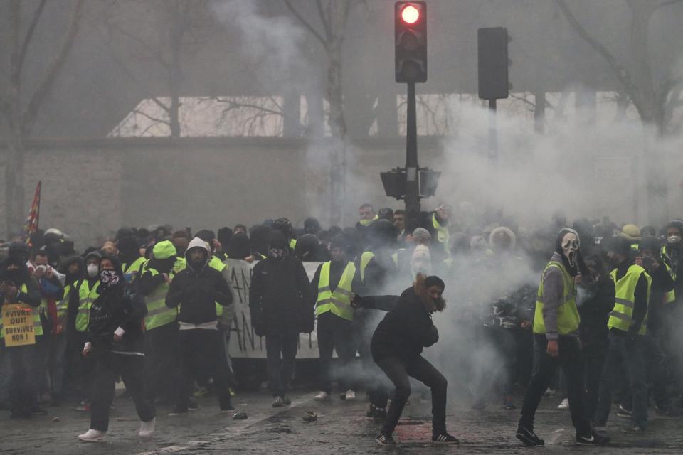 People faced riot police in Paris (AFP/Getty Images)