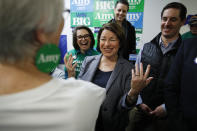 Democratic presidential candidate Sen. Amy Klobuchar, D-Minn., reacts while meeting supporters at a campaign office, Saturday, Feb. 22, 2020, in Las Vegas. (AP Photo/John Locher)