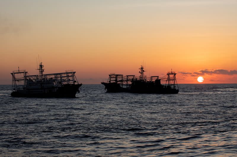 FILE PHOTO: Chinese Maritime Militia vessels are pictured near the Second Thomas Shoal in the South China Sea