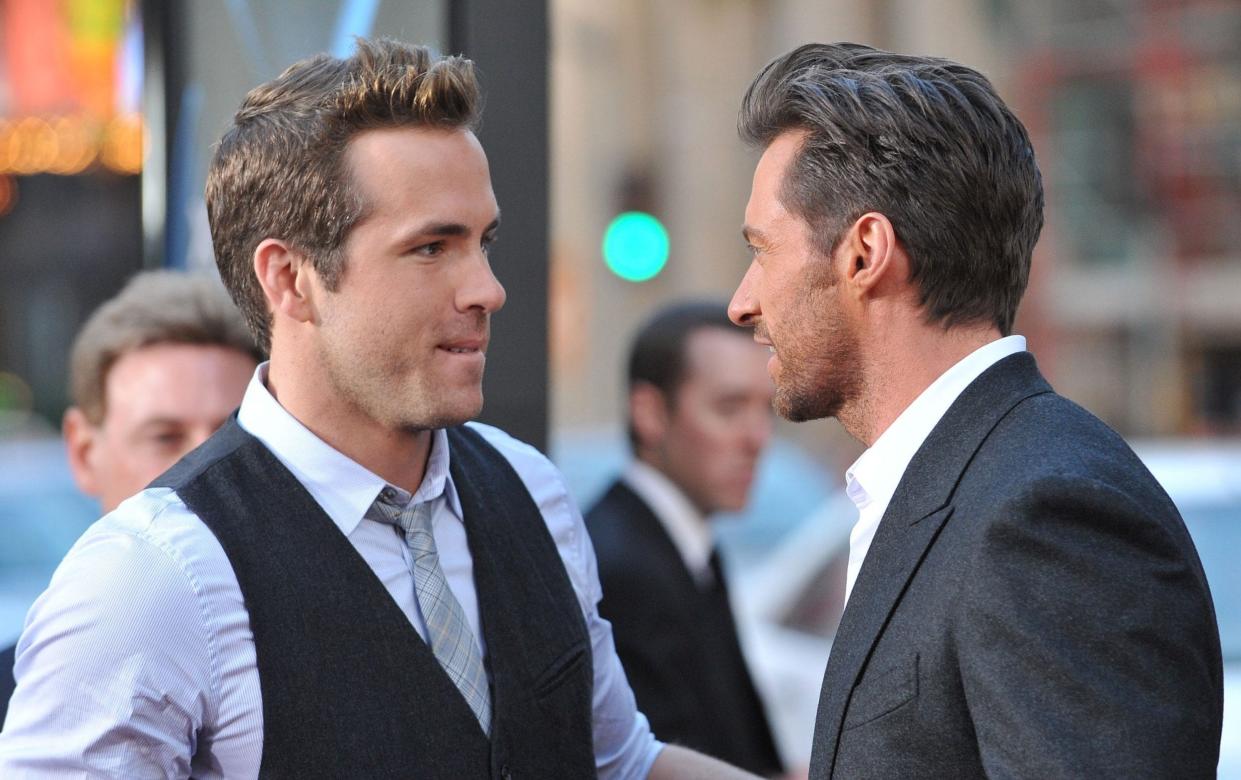 Say what? Ryan Reynolds and Hugh Jackman, pictured in 2009 - Jon Kopaloff