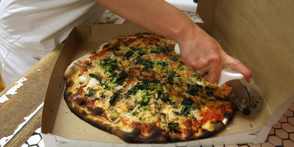 <p>Characterized by a thin chewy crust so charred that your fingertips can be black after eating it, New Haven-style "apizza" (pronounced "a-bheets") is the kind of pizza you have dreams about eating. <a rel="nofollow noopener" href="http://www.pepespizzeria.com/" target="_blank" data-ylk="slk:Frank Pepe Pizzeria Napoletana;elm:context_link;itc:0;sec:content-canvas" class="link ">Frank Pepe Pizzeria Napoletana</a>—simply referred to as Pepe's by locals—is the original spot and is also responsible for inventing the white clam pie. Other go-to pizzerias include <a rel="nofollow noopener" href="http://sallysapizza.com/index.html" target="_blank" data-ylk="slk:Sally's;elm:context_link;itc:0;sec:content-canvas" class="link ">Sally's</a> and <a rel="nofollow noopener" href="http://dalegna.com/" target="_blank" data-ylk="slk:De Legna;elm:context_link;itc:0;sec:content-canvas" class="link ">De Legna</a>.</p>