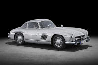 <p>The 300 SL was an outlier in the Mercedes line-up of the 1950s, and was not originally planned as a road car at all. It started out as a not very powerful, but exceptionally light and aerodynamic, <strong>sports racer</strong> which finished first and second in both the Le Mans 24 Hours and Mexico’s Carrera Panamericana in 1952.</p><p>A road-going version was suggested by US importer <strong>Max Hoffman</strong> (1904-1981) in September 1953. Mercedes had one on display – still with the gullwing doors and direct fuel injection of the racer – at the New York International Motor Sports Show just five months later, and offered it for sale from then until 1957. It was replaced by a mechanically similar <strong>roadster</strong> which remained on the market for six years. The roadster was a beautiful car, but we prefer the Gullwing.</p>