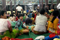 <p>Evacuees stay in a temple after a dam breach near Swar township in Myanmar, Aug. 29, 2018. (Photo: Antoni Slodkowski/Reuters) </p>