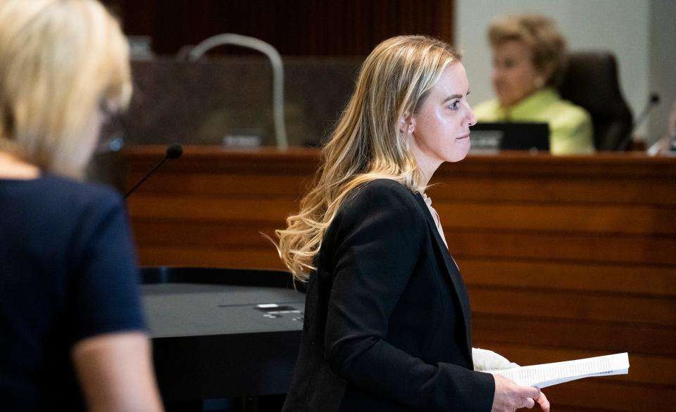 Dr. Katherine Roxanne Grawe, known to her online followers and patients as "Dr. Roxy," stands at the State Medical Board of Ohio meeting where her medical license was revoked for good in July. The doctor's license was originally suspended in November 2022.