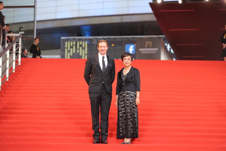 Macao Government Tourism Office director Maria Helena de Senna Fernandes and Iffam artistic director Mike Goodridge on the red carpet. — Picture courtesy of Iffam