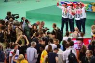 <p>Gold medalists Steven Burke, Owain Doull, Edward Clancy and Bradley Wiggins of Team Great Britain pose for photographs after the medal ceremony for the Men’s Team Pursuit on Day 7 of the Rio 2016 Olympic Games at the Rio Olympic Velodrome on August 12, 2016 in Rio de Janeiro, Brazil. (Photo by Harry How/Getty Images) </p>