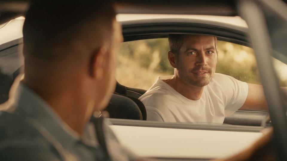 Paul Walker looking at Vin Diesel at the end of Furious 7