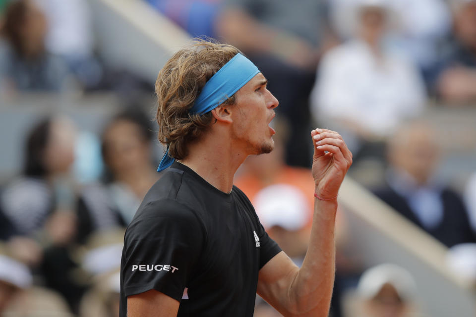 Germany's Alexander Zverev reacts after missing a shot against Serbia's Novak Djokovic during their quarterfinal match of the French Open tennis tournament at the Roland Garros stadium in Paris, Thursday, June 6, 2019. (AP Photo/Michel Euler)