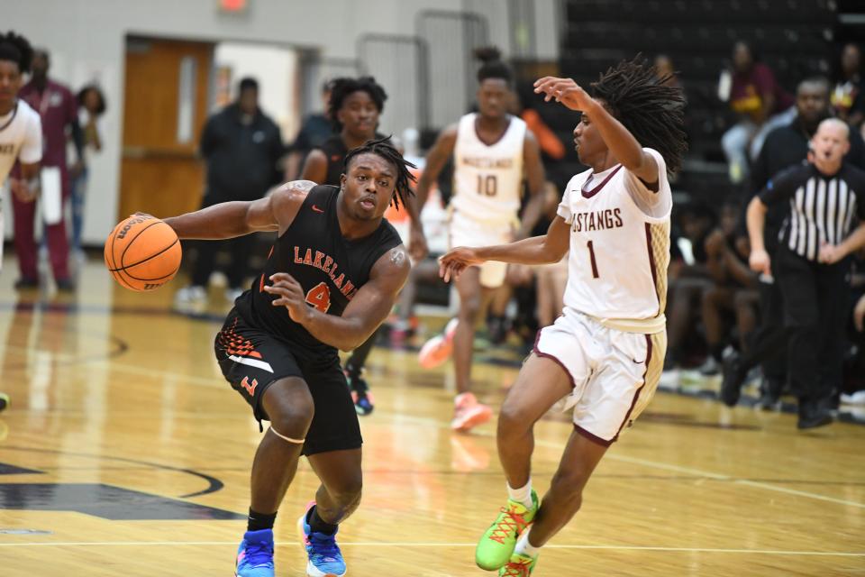 Lakeland's Rolijah Hardy drives hard to the hoop in a regional championship game vs. Wekiva High School on Friday, Feb. 24, 2023 at Wekiva High School.