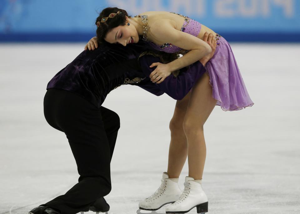 Meryl Davis and Charlie White of the U.S. compete during the Figure Skating Ice Dance Free Dance Program at the Sochi 2014 Winter Olympics, February 17, 2014. (REUTERS/Alexander Demianchuk)