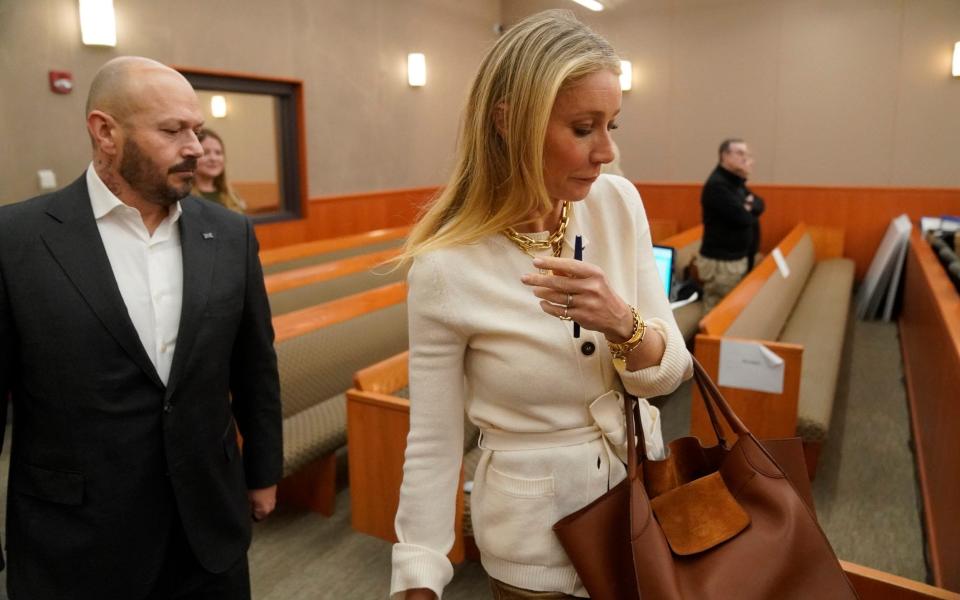 Paltrow in court wearing a statement necklace - POOL AP